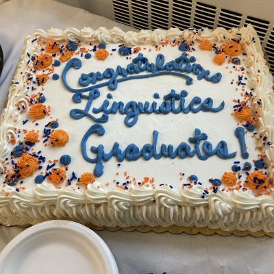 Photograph of cake decorated to read "Congratulations Linguistics Graduates!"